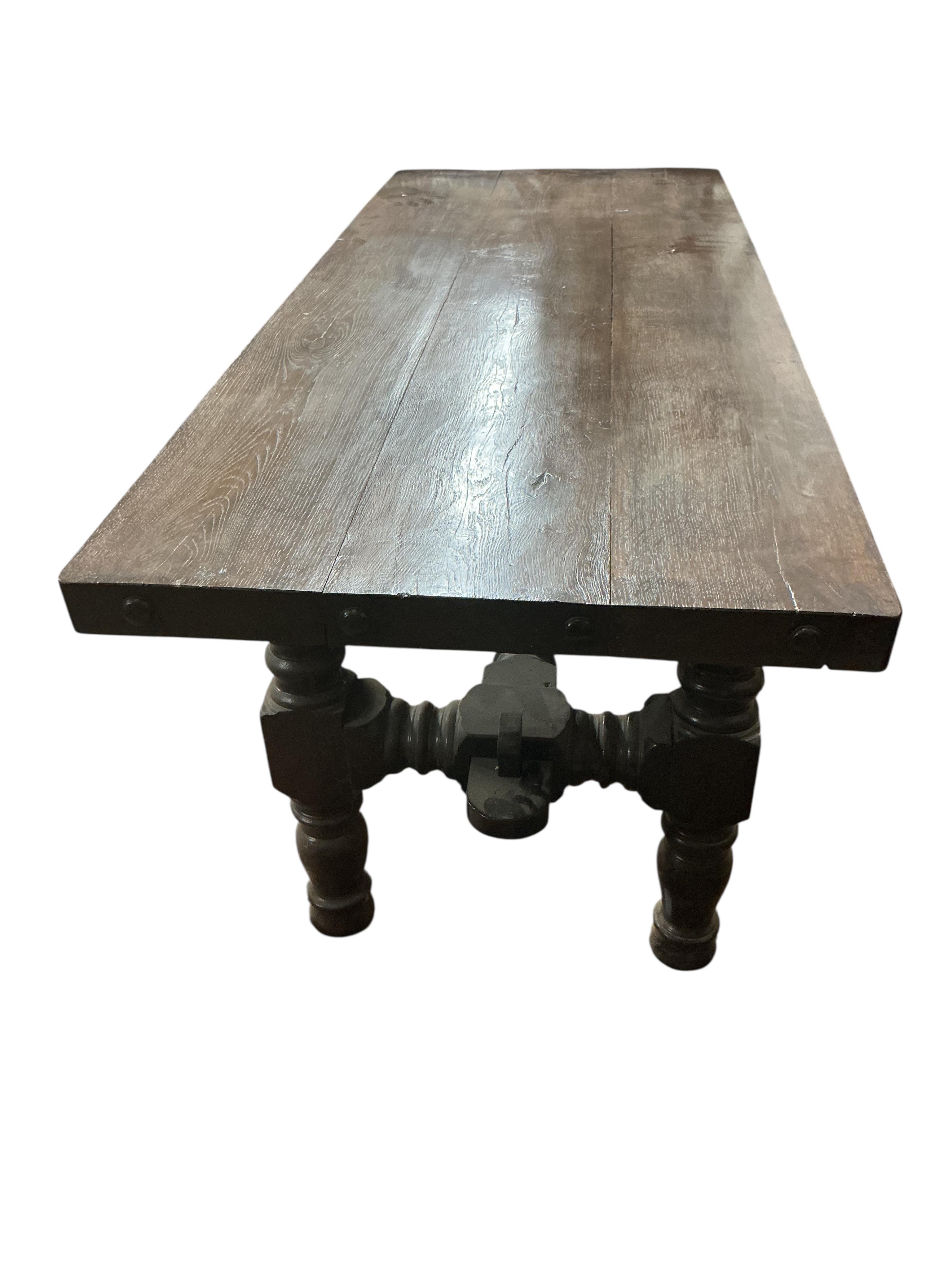 An 18th century style rectangular oak refectory dining table on turned underframe, width 186cm, depth 74cm, height 73cm